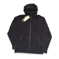 A black hooded zip-up jacket with integrated goggles on the hood, shown flat against a white background with a paper tag attached.