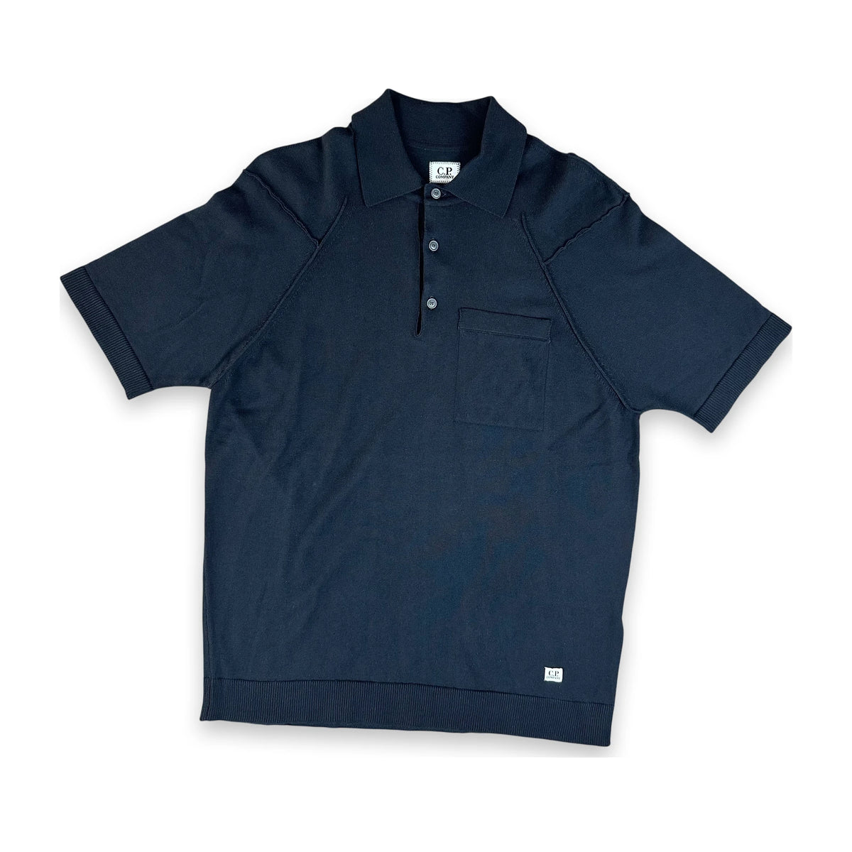 A dark navy blue short-sleeve polo shirt with a two-button placket and a chest pocket, laid flat against a white background.