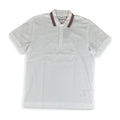 A white short-sleeve polo shirt with a double stripe collar in red and navy, featuring a three-button placket and a small embroidered logo on the left chest.