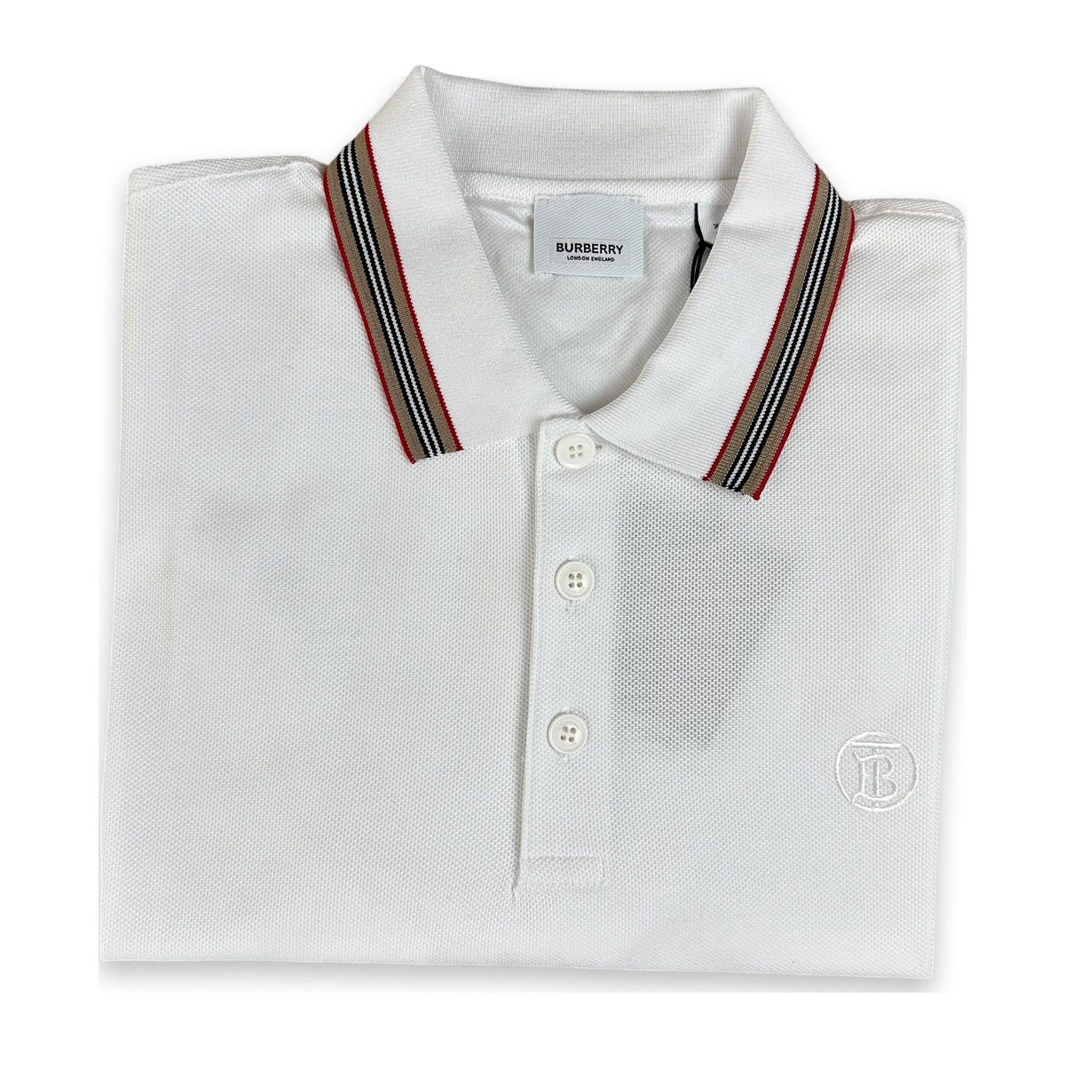 A folded white Burberry polo shirt with a striped navy, red, and white collar, featuring a three-button placket and a small embroidered Burberry logo on the left chest.