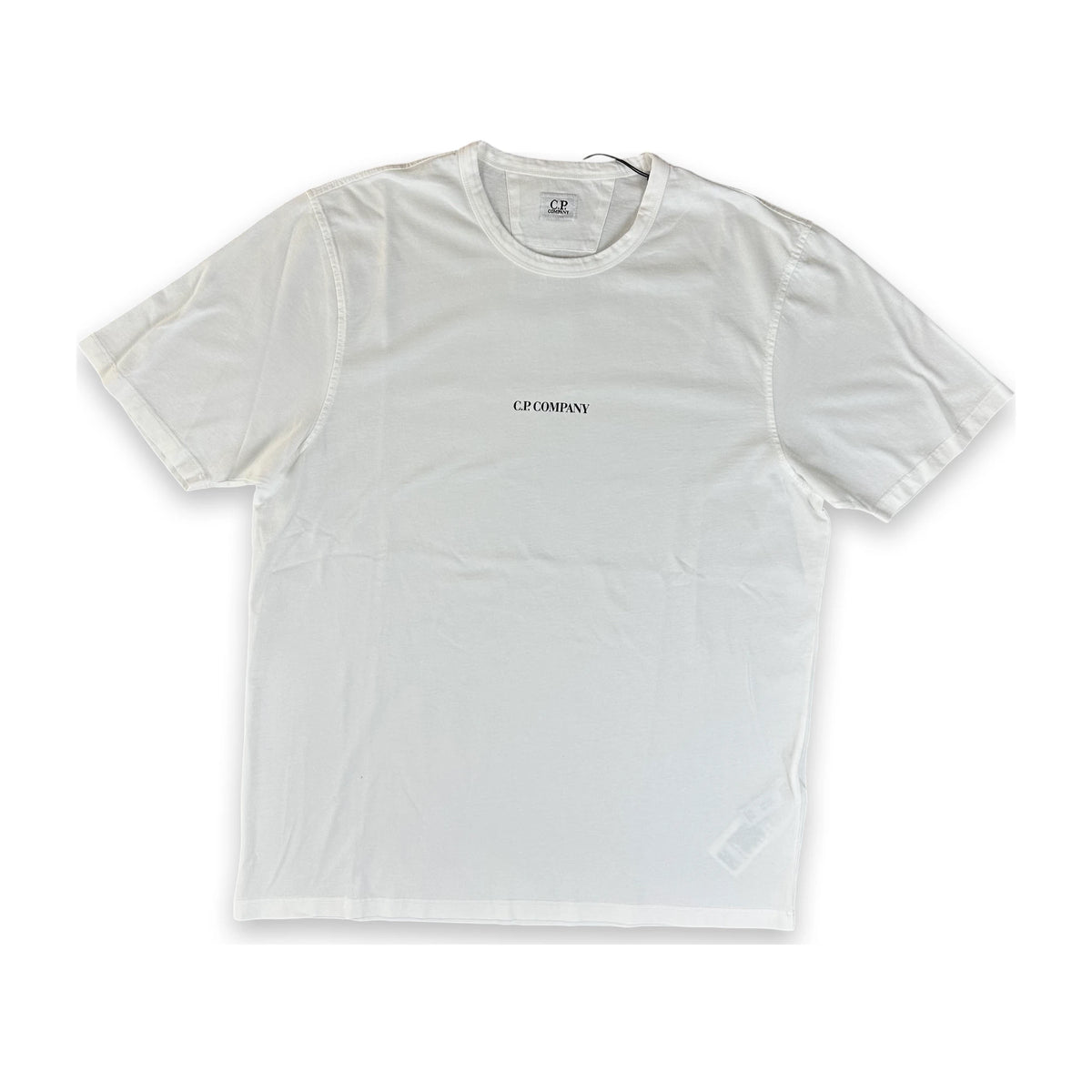 A white short-sleeve crewneck t-shirt with 'CP COMPANY' printed in black on the left chest, displayed flat against a white background.