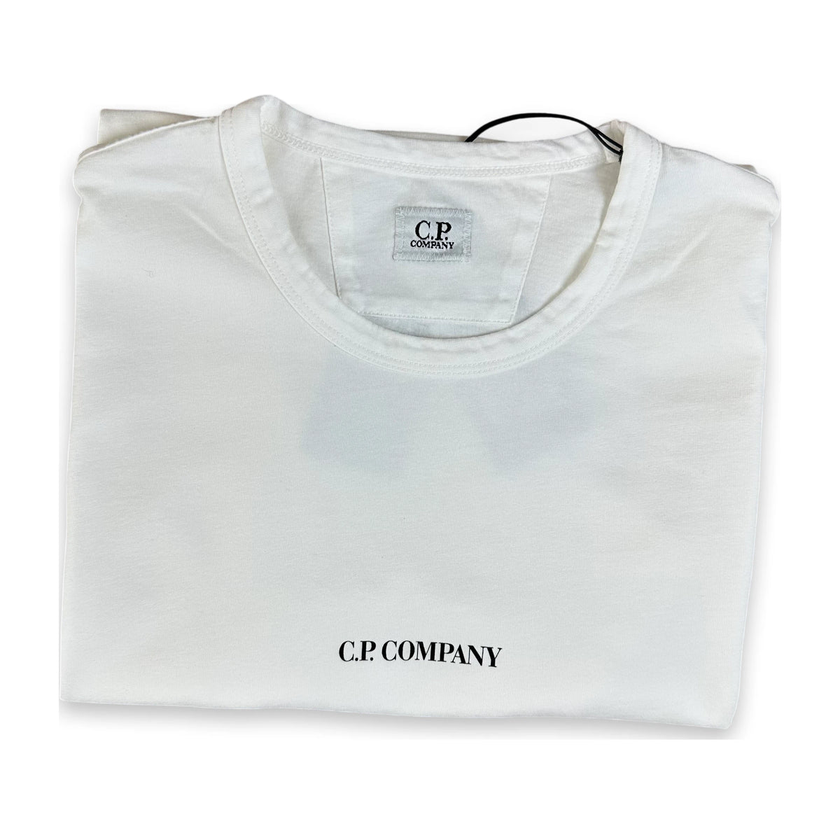 A folded white crewneck t-shirt with 'C.P. COMPANY' printed in black on the front, displayed on a clean white background.