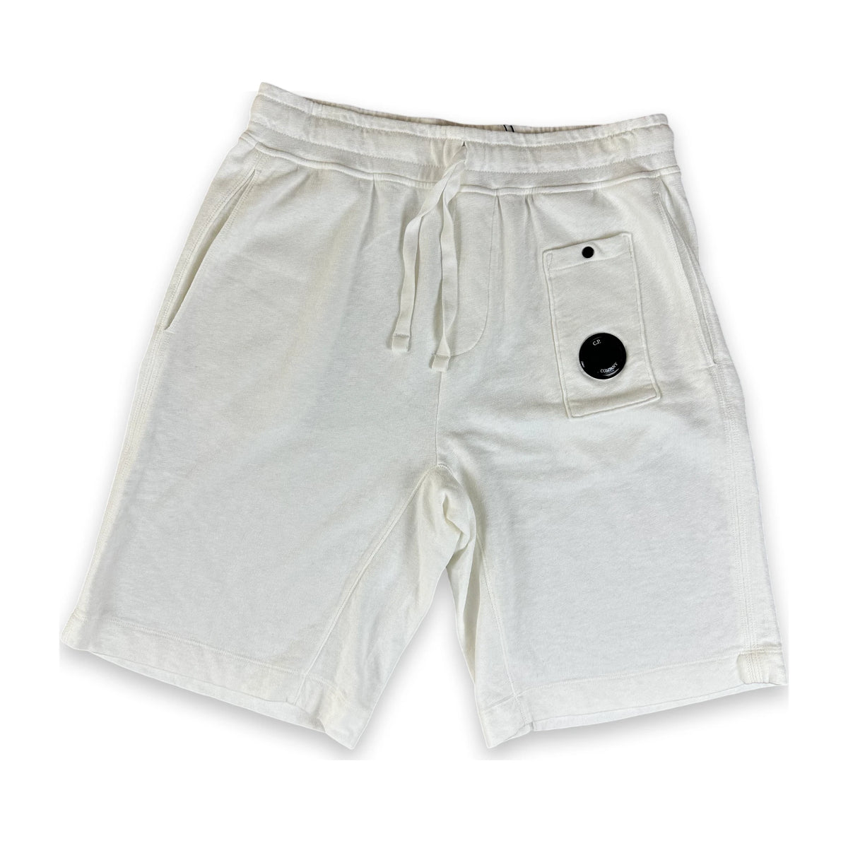 A pair of white cotton shorts with an elastic waistband, laid flat on a white background.