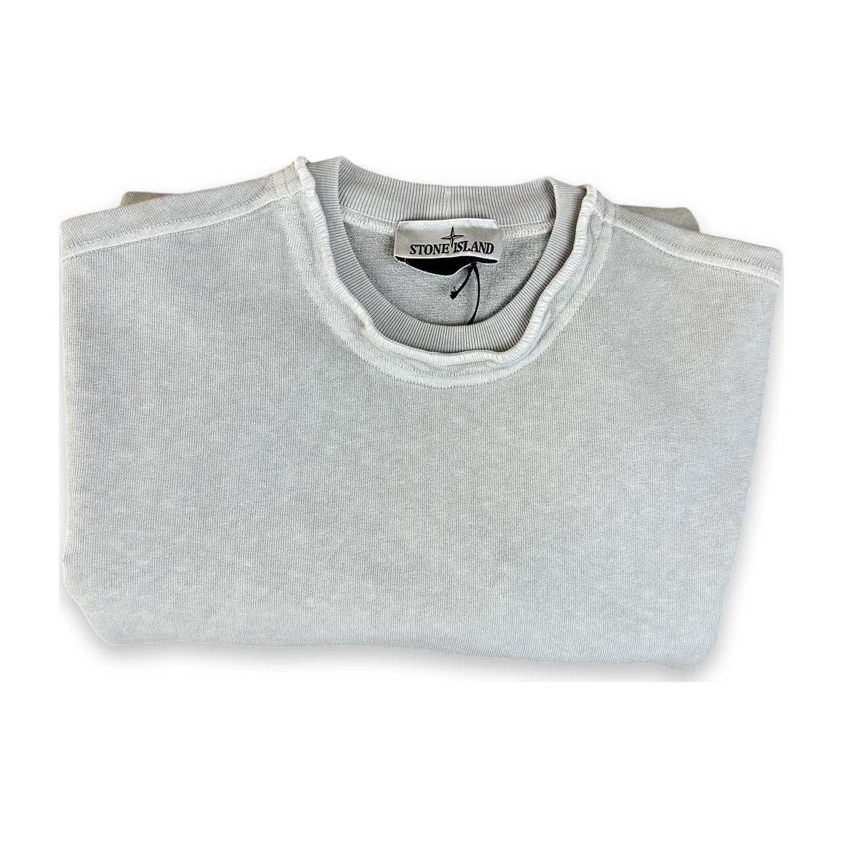 A folded light gray heather crewneck sweatshirt from Stone Island, shown on a clean white background.