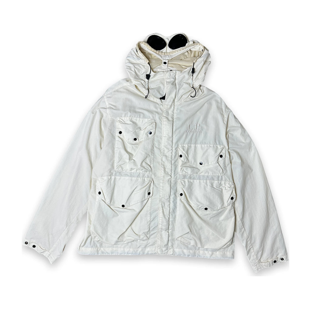An off-white hooded utility jacket with multiple front pockets and snap-button details, laid flat against a white background.
