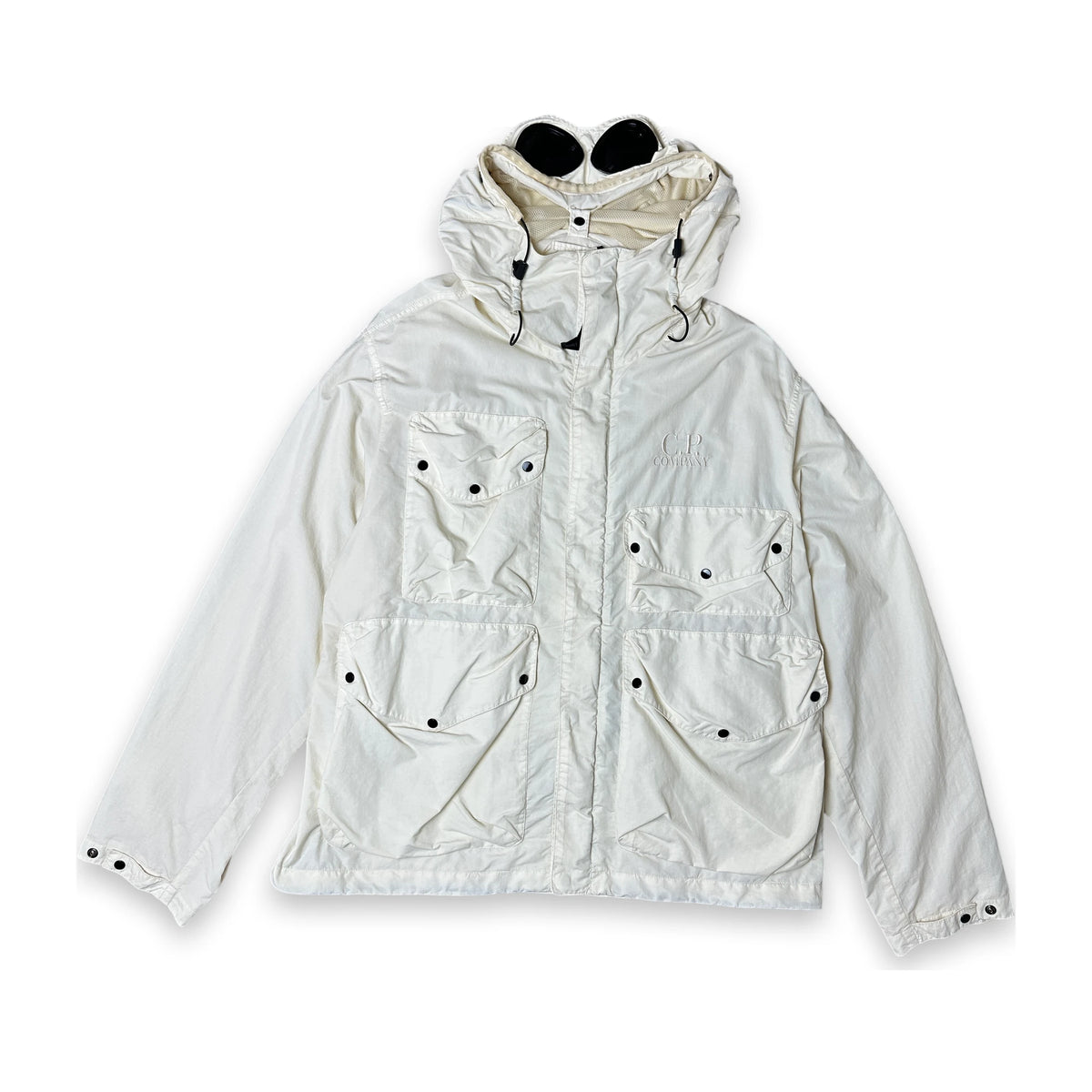 An off-white hooded utility jacket with multiple front pockets and snap-button details, laid flat against a white background.