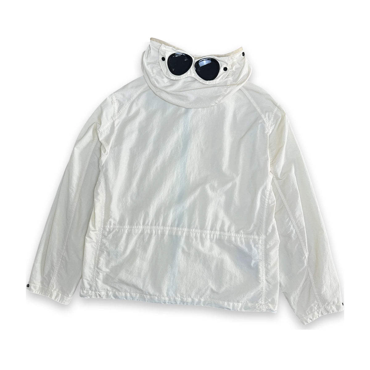 A white lightweight windbreaker jacket with a high collar, shown flat against a white background. Small black sunglasses are placed on top of the collar as a styling prop.