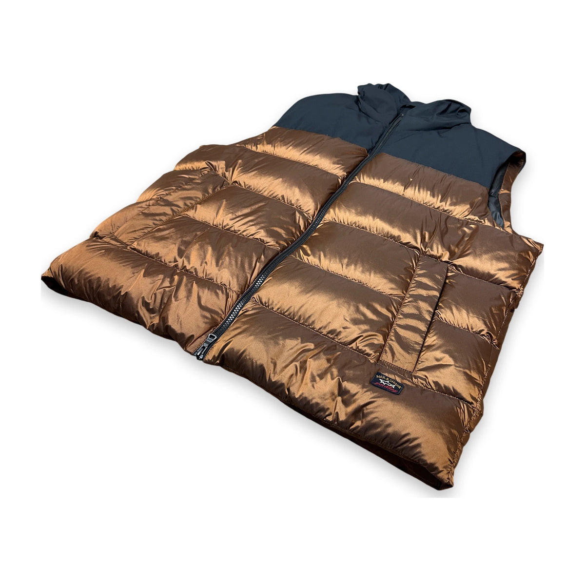 A puffer vest with a metallic bronze-brown body and a dark navy hood, shown on a clean white background. A small Patagonia logo is visible near the lower right hem.