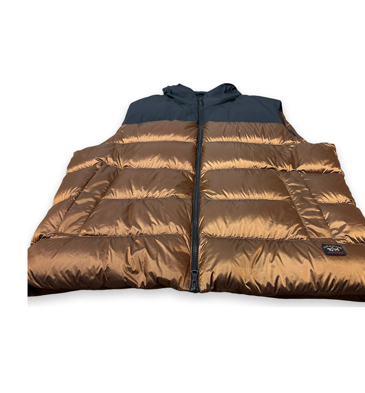 A puffer vest with a metallic bronze-brown body and a dark navy hood, shown flat against a white background.