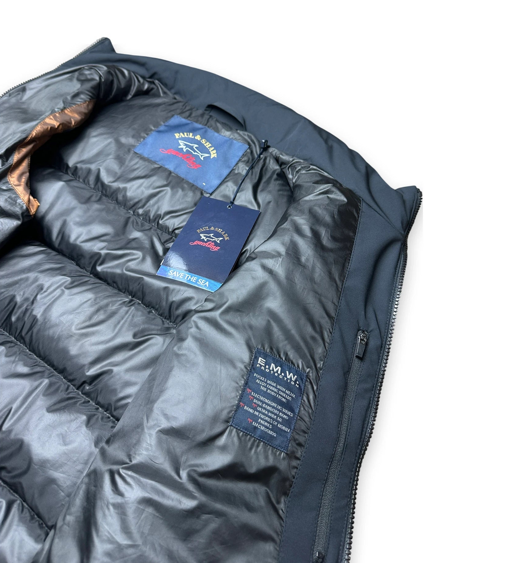 Inside of a gilet showing the logo 'Paul & Shark' and the swing tag