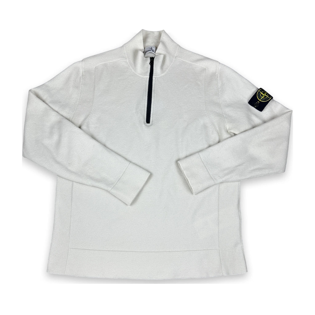 A white long-sleeve quarter-zip pullover sweatshirt with a black zipper and a black Stone Island compass patch on the left sleeve, shown on a plain white background.