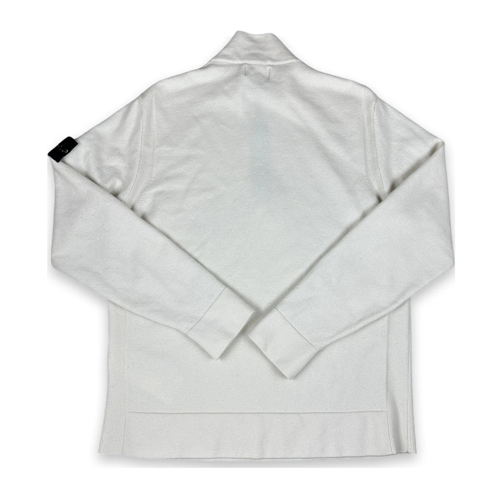 A white long-sleeve quarter-zip jacket with a mock neck collar, shown from the back and laid flat on a white background. A small black fabric tag is visible on the left sleeve.
