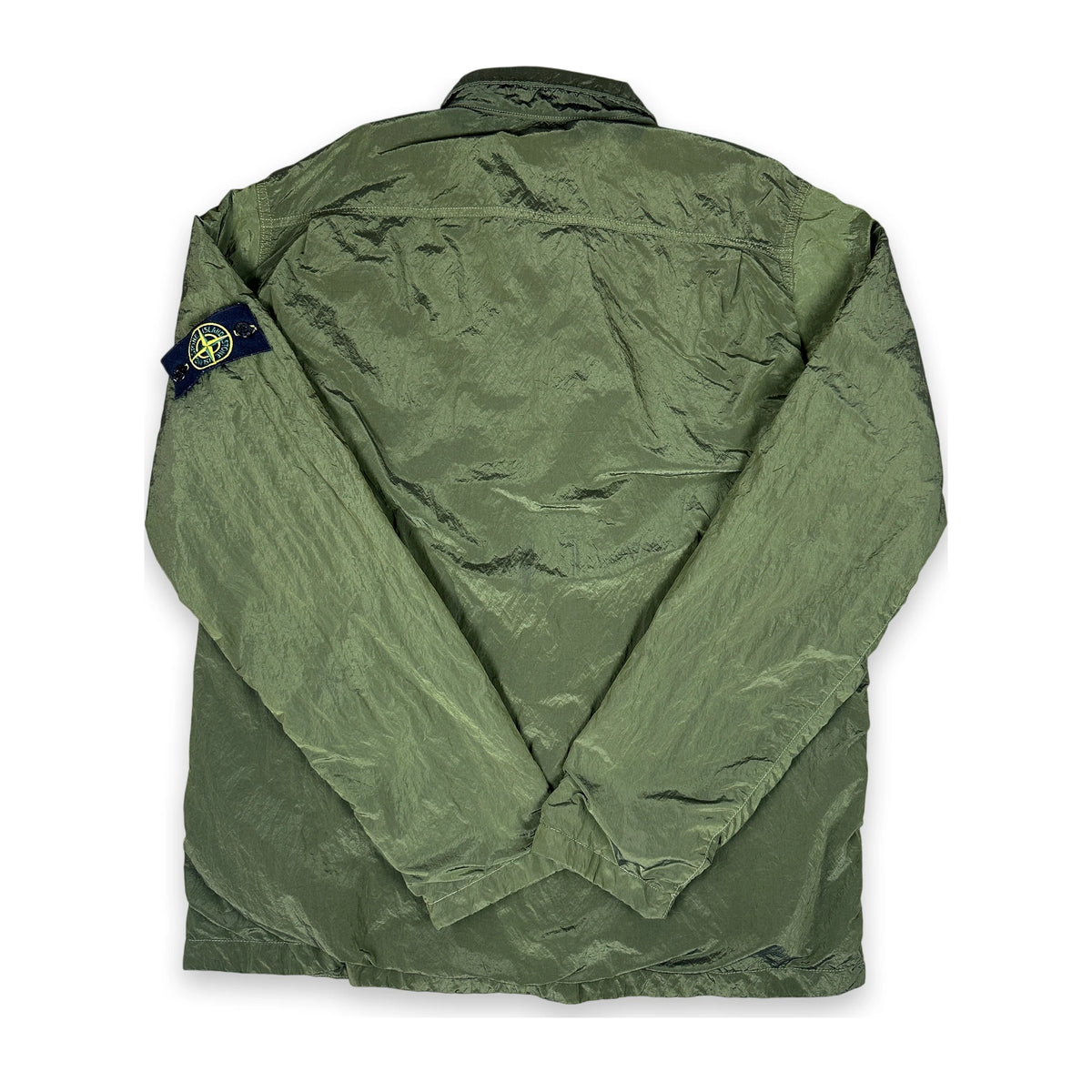 Nylon Metal jacket in green with iconic stone island badge flat layed on a white background